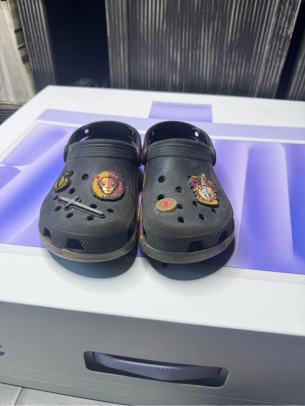 CROCS Kids Black Clogs with Red & Yellow Stripe Accents